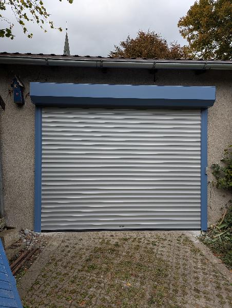 Referenz | RST-RÜGEN | Roma Rolltor | Trent